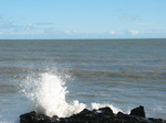 24240 Waves crashing on beach wind mills.jpg